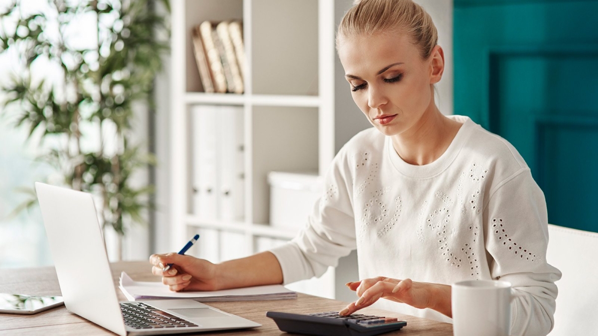 demo-attachment-469-concentrated-woman-budgeting-at-office-RVS7TEP