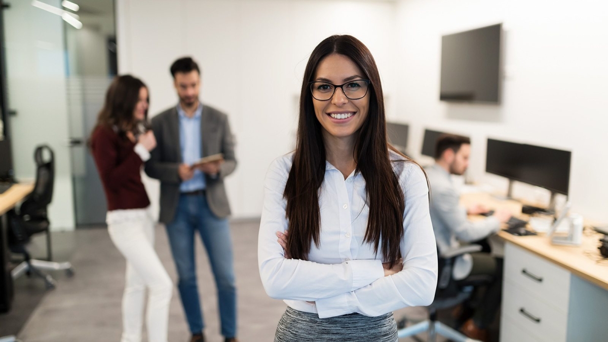 demo-attachment-472-portrait-of-young-businesswoman-posing-in-office-WEU5FBG